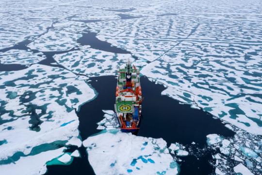 The sea ice is surprisingly weak, has lots of melt ponds, and the expedition ship Polarstern was able to easily break through. Photo: Steffen Graupnerice / MOSAiC