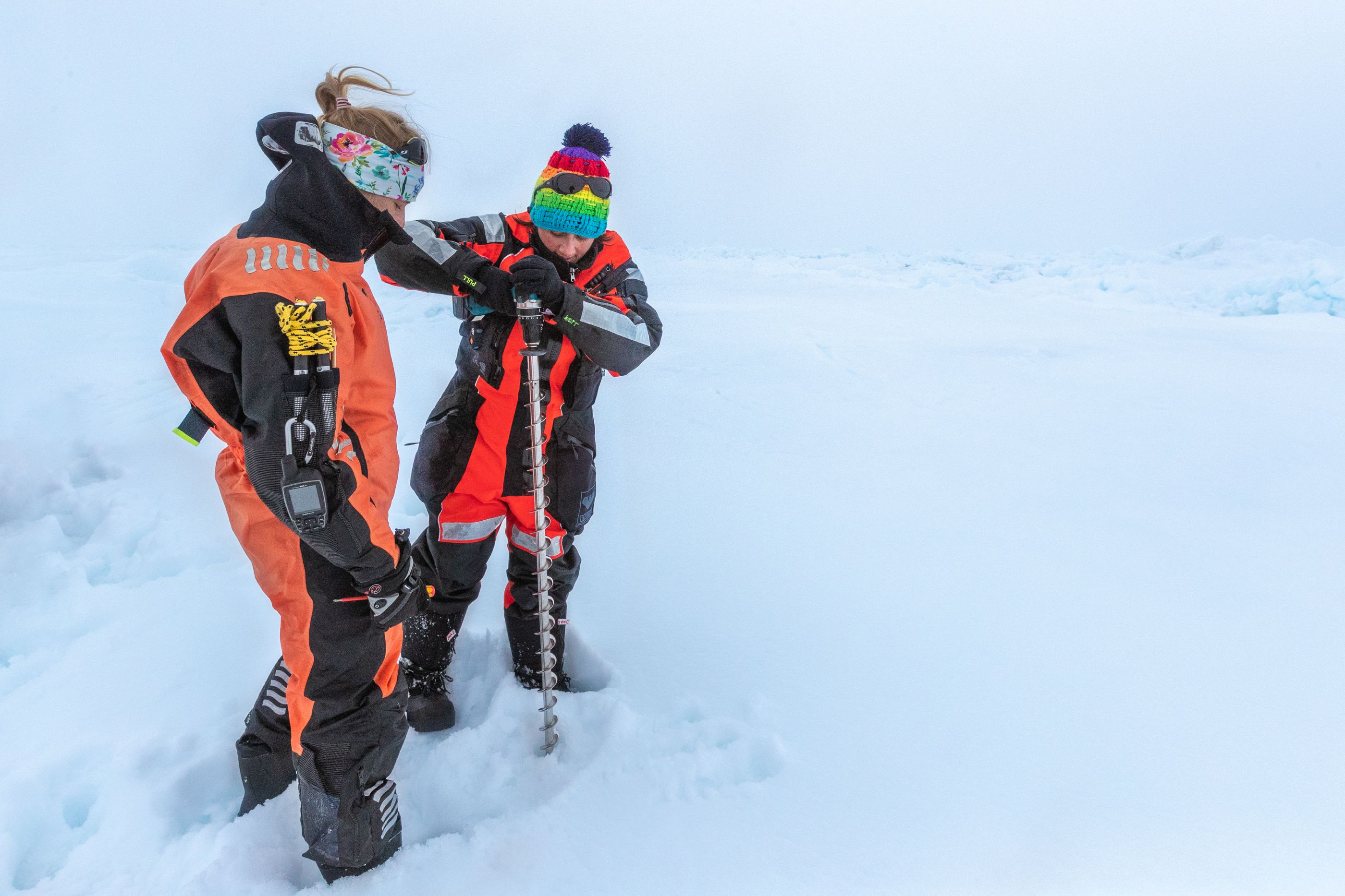 Scientists drilling ice cores