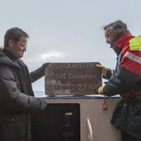 Markus Rex (L) and Captain Wunderlich (R) hold the steel plaque commemorating the Polarstern's arrival at the North Pole; Photo credit: Lianna Nixon, CIRES/CU Boulder