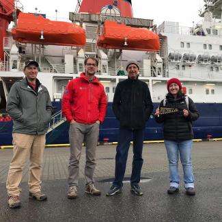 Chris Cox, Matthew Shupe, Byron Blomquist and Sara Morris in front of Polarstern. Image: CIRES/CU Boulder Chris Cox, Matthew Shupe, Byron Blomquist and Sara Morris in front of Polarstern