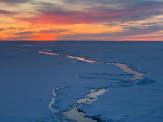 leads in ice, sunset/sunrise sky