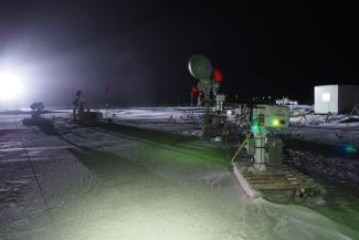 scientific equipment on ice in dark