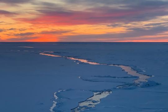 leads in ice, sunset/sunrise sky
