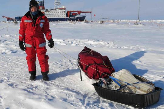 Carin Ashjian, a WHOI biologist, has been studying zooplankton aboard a German icebreaker attached to an ice floe in the Arctic Ocean. Now, she's experiencing an additional two months on the ship, as another team of scientists go through a period of quarantining before she can be replaced.SERDAR SAKINAN