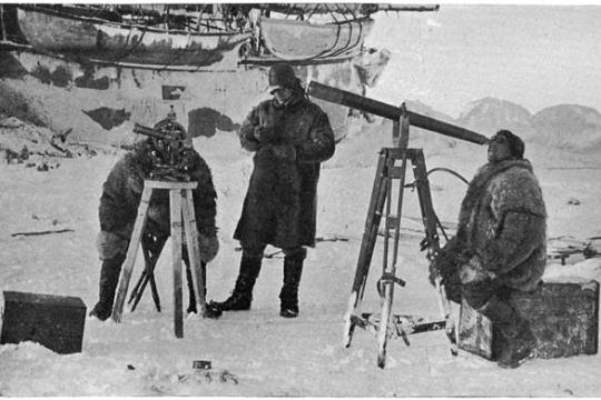 Nansen and his crew with a telescope